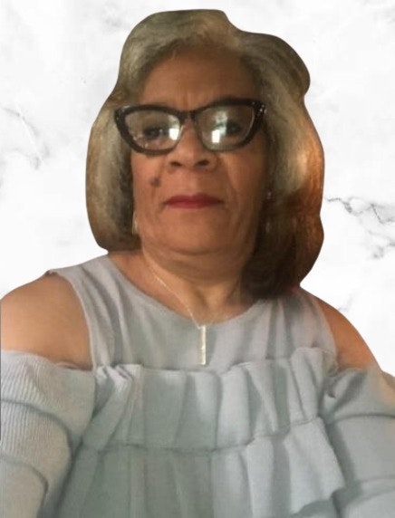 An individual with glasses and a grey top is shown against a white background.