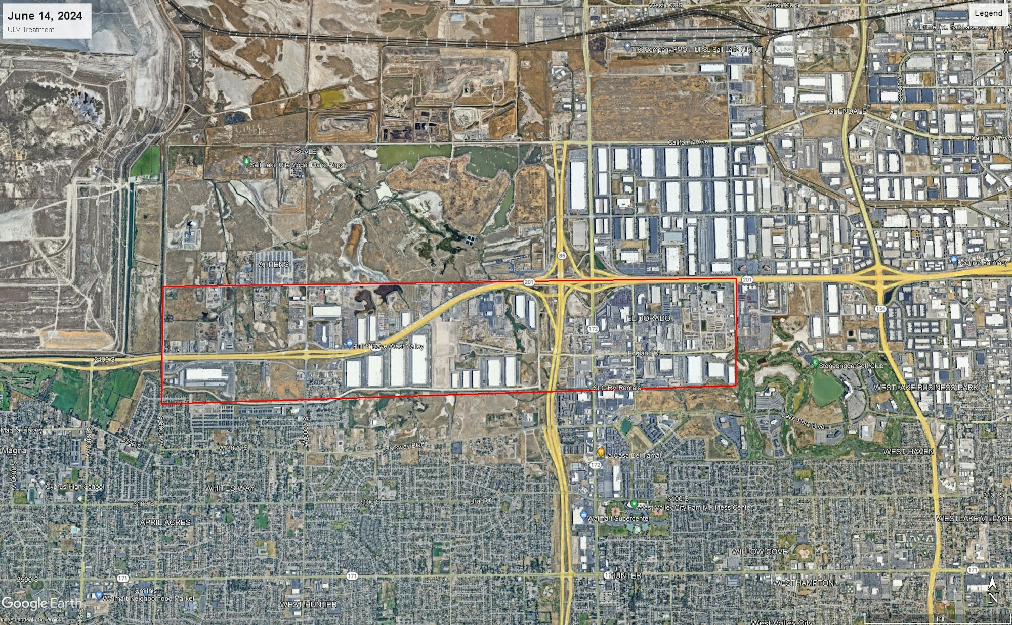 Satellite view of a city area with industrial zones, highways, and residential neighborhoods. Date: June 14, 2024.