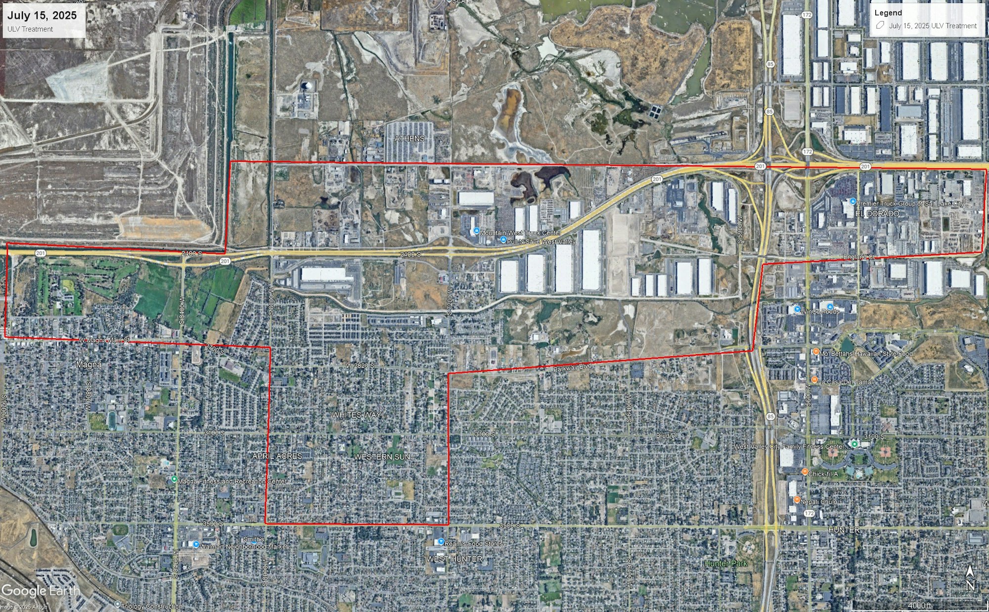 Aerial view of an urban area with a red boundary indicating a ULV treatment zone on July 15, 2025.