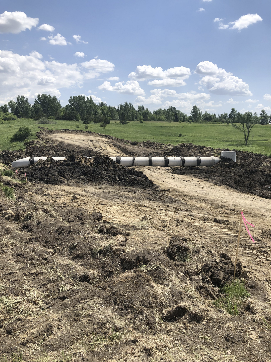 May contain: soil, pipeline, and ground