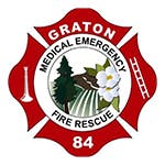 A badge with text "Graton Fire Rescue Medical Emergency 84," featuring a tree, flower, and fire rescue tools.