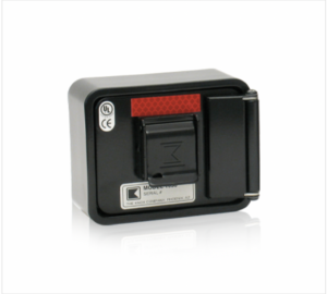 A black box with a red reflective strip, possibly a type of sensor or electronic device.