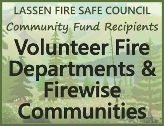 Sign about Lassen Fire Safe Council, mentioning fund recipients: Volunteer Fire Departments and Firewise Communities.