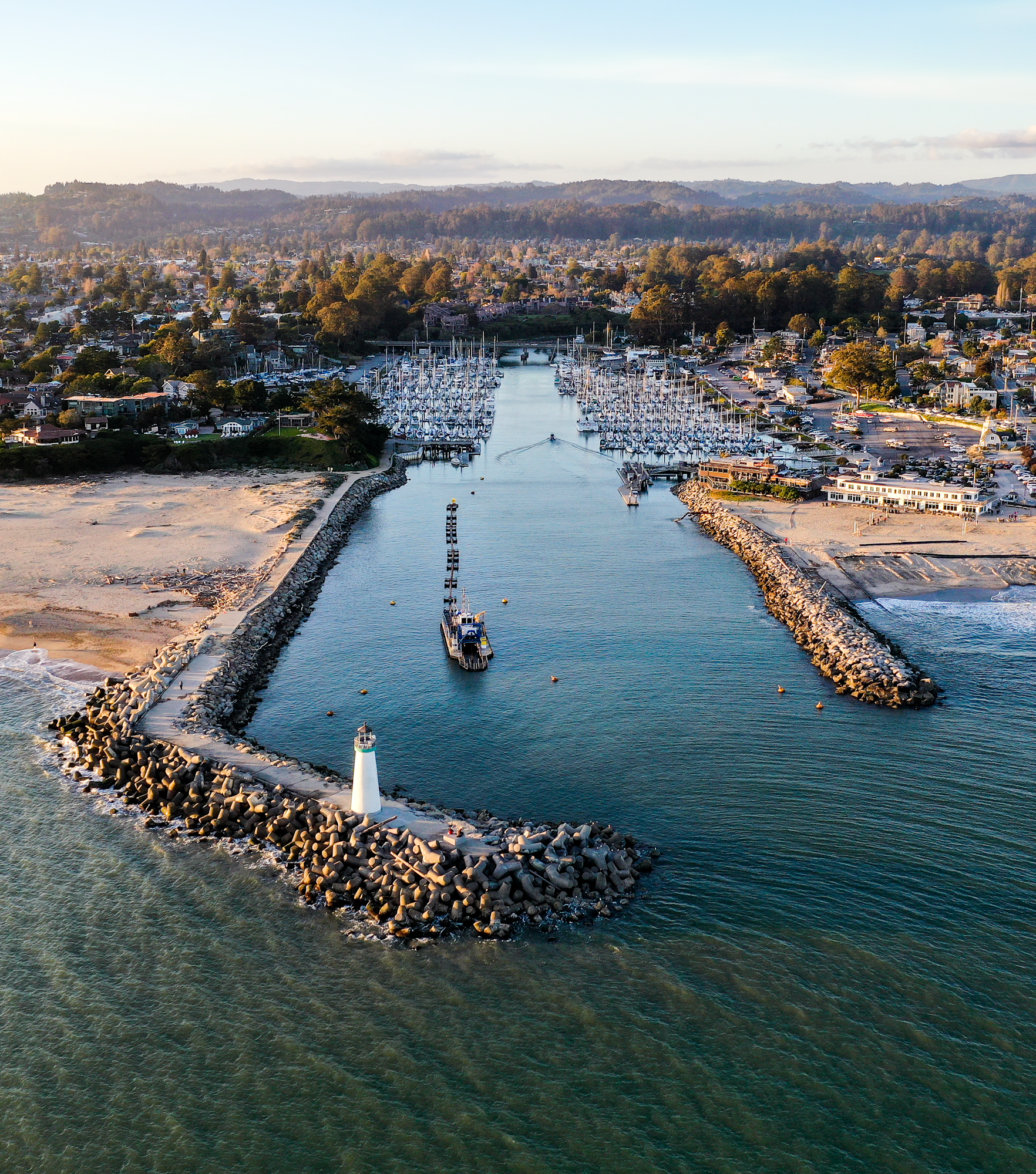 May contain: water, waterfront, architecture, building, cityscape, urban, pier, harbor, outdoors, nature, sea, and port