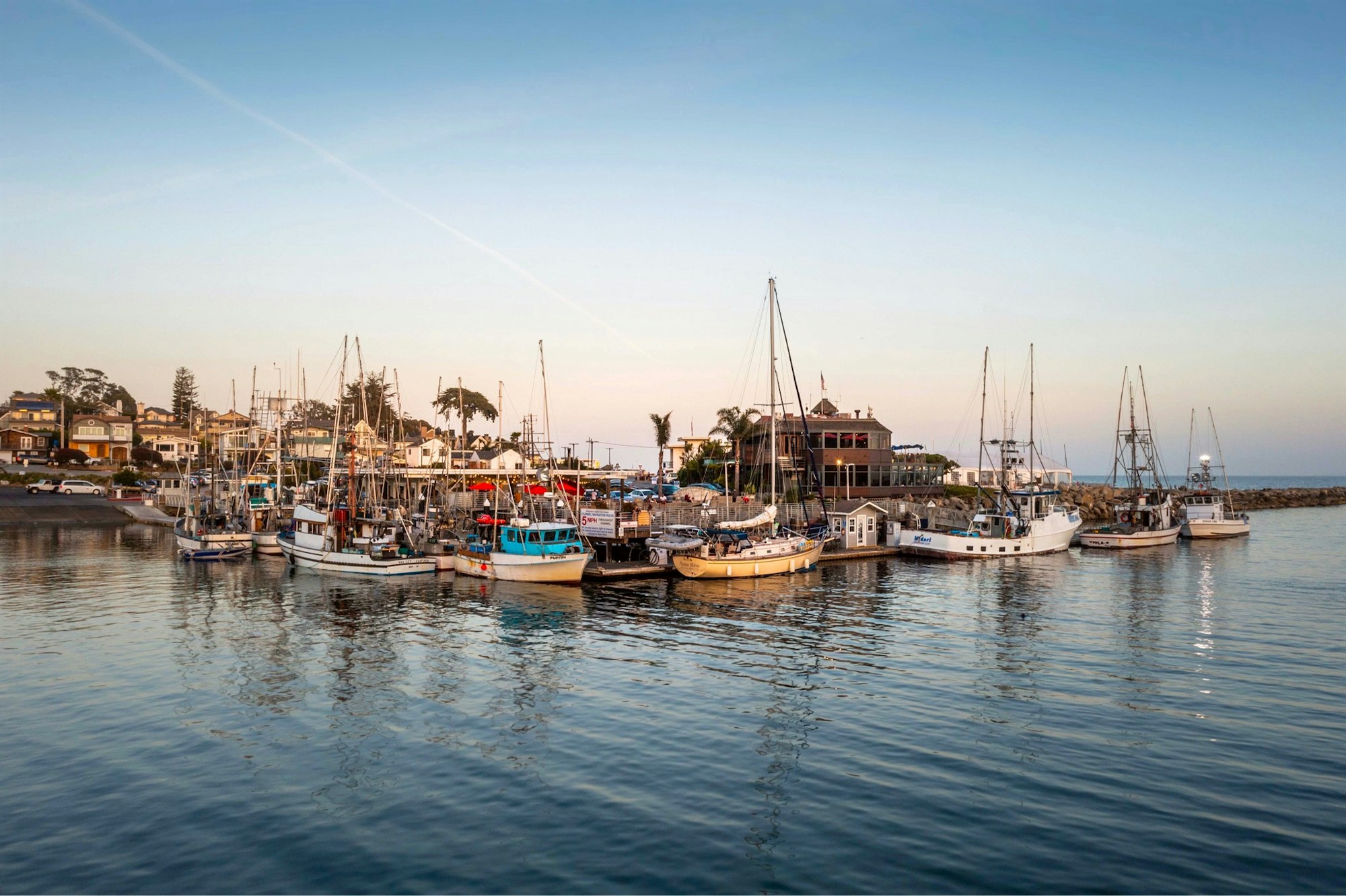 May contain: waterfront, water, harbor, pier, port, marina, boat, vehicle, transportation, sailboat, and car