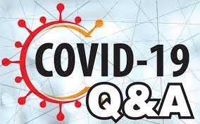 Graphic with "COVID-19 Q&A", depicting a stylized coronavirus and geometric background.