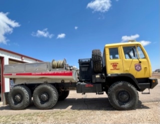 May contain: flat bed truck, transportation, truck, vehicle, and tire