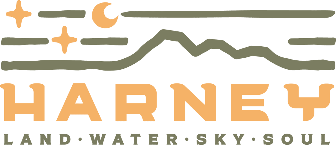 Stylized landscape with stars and a crescent above "HARNEY" and the words "LAND.", "WATER.", "SKY.", "SOUL." below.