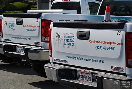 Two Contra Costa Mosquito & Vector Control district trucks.