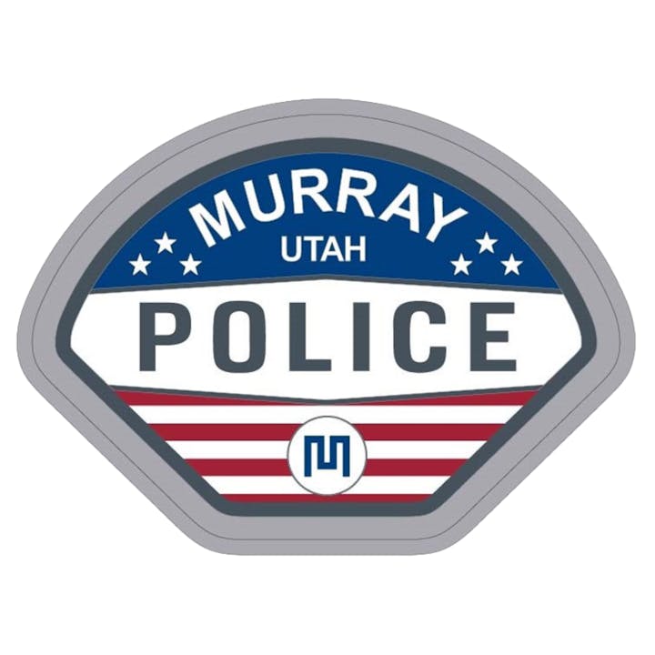 Murray Utah Police badge with stars and stripes design.