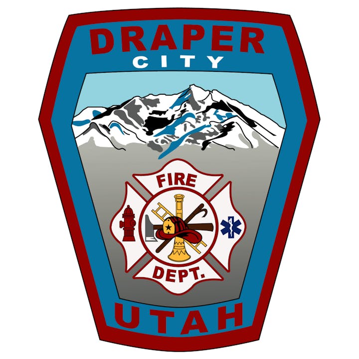 Patch for Draper City Fire Dept. in Utah, featuring mountains, firefighting tools, and the Star of Life symbol.