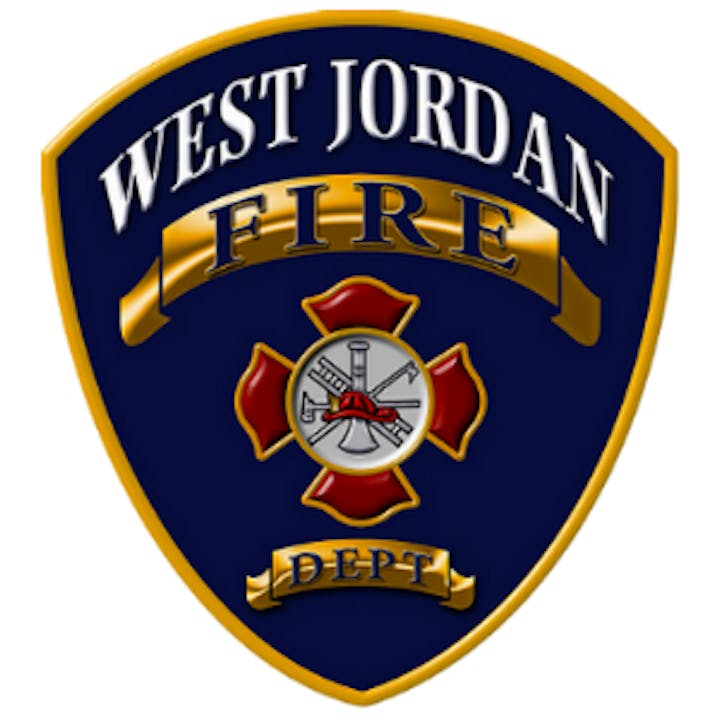 West Jordan Fire Department emblem with fire-related symbols on a navy and gold shield background.