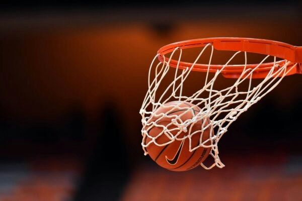 basketball going through the hoop and net