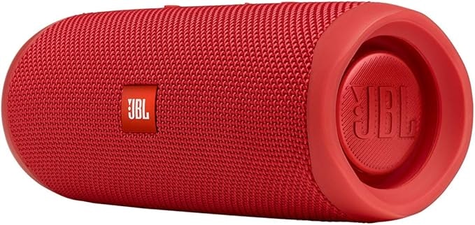 A red JBL portable Bluetooth speaker with a cylindrical design.
