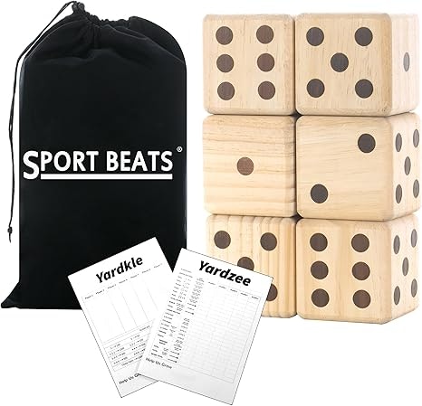 Large wooden dice, Yardkle and Yardzee scorecards, and a black Sport Beats bag.