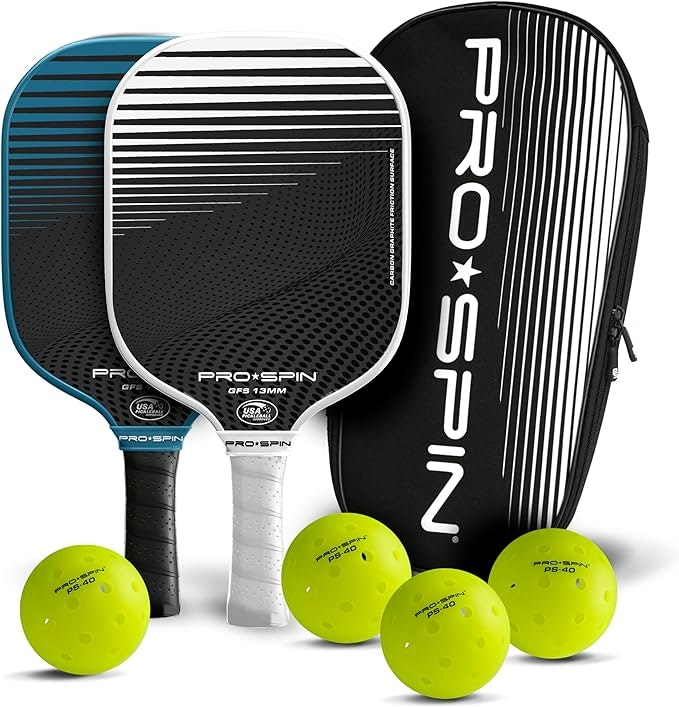 Two pickleball paddles, four yellow pickleballs, and a black PRO-SPIN case.