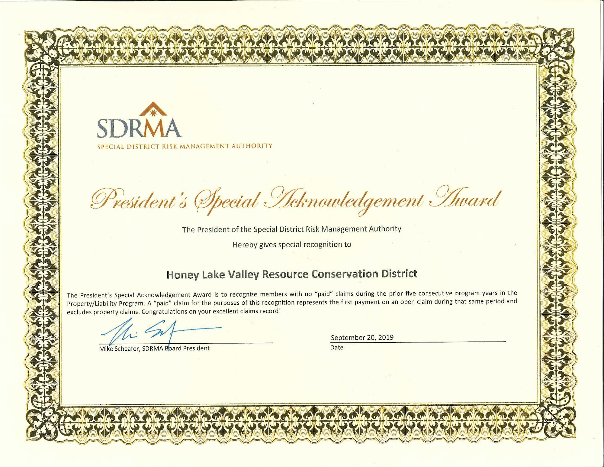 It's a certificate of recognition awarded to Honey Lake Valley Resource Conservation District for excellent claims record by SDRMA.