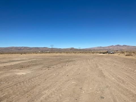 May contain: soil, nature, outdoors, ground, desert, land, sand, landscape, panoramic, scenery, and wilderness
