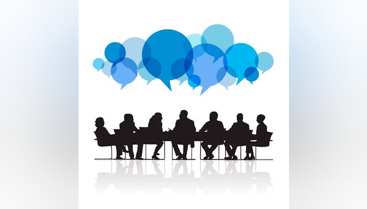 Silhouettes of people in a meeting with blue speech bubbles above them, signifying discussion or brainstorming.