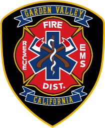 An emblem of Garden Valley Fire/Rescue/EMS District, California with a Star of Life.