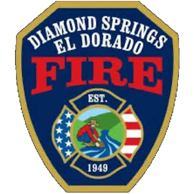 A badge emblem for Diamond Springs El Dorado Fire Department, established in 1949.