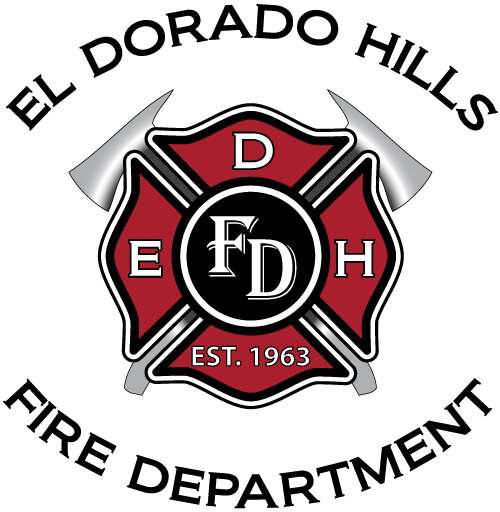 Fire department emblem with axes, established in 1963.