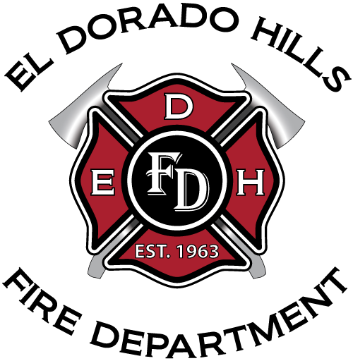 Fire department emblem with axes, established in 1963.