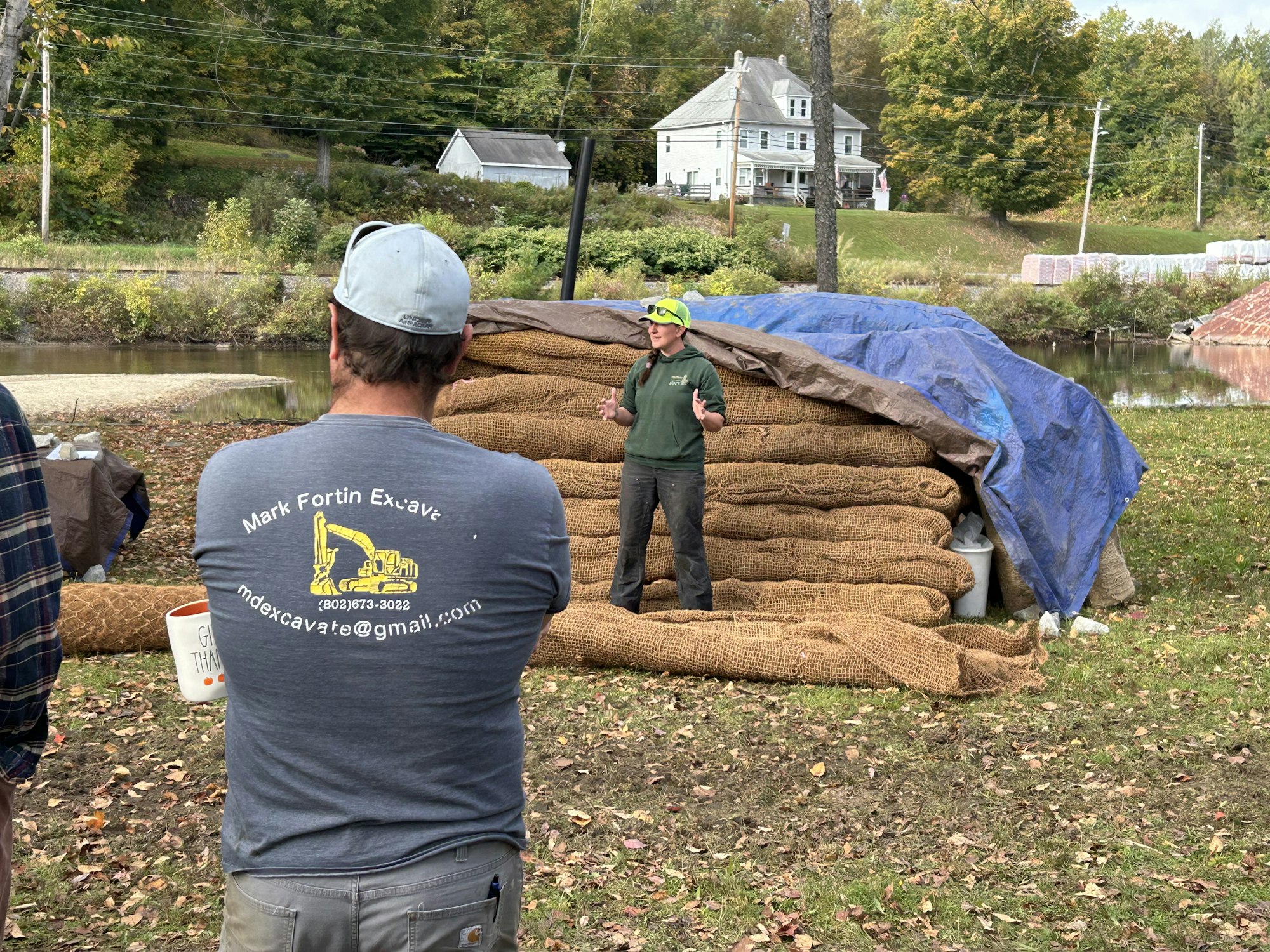 Excavator listening at shoreland workshop