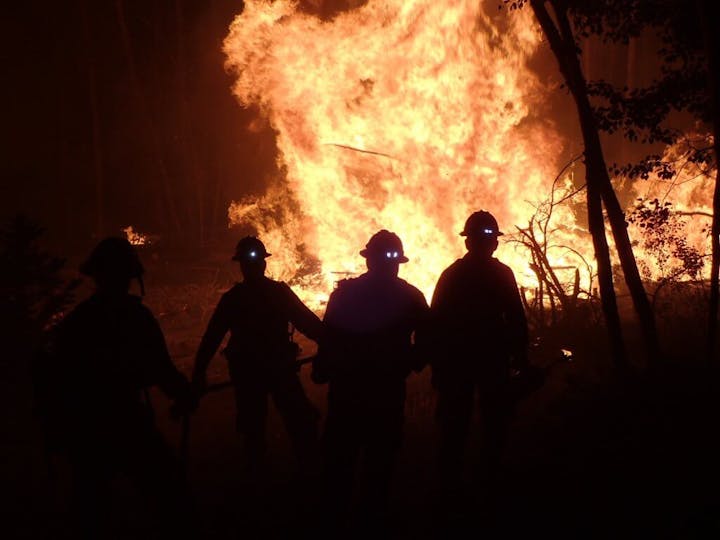 May contain: adult, male, man, person, fire, and flame