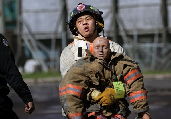May contain: adult, male, man, person, fireman, and helmet
