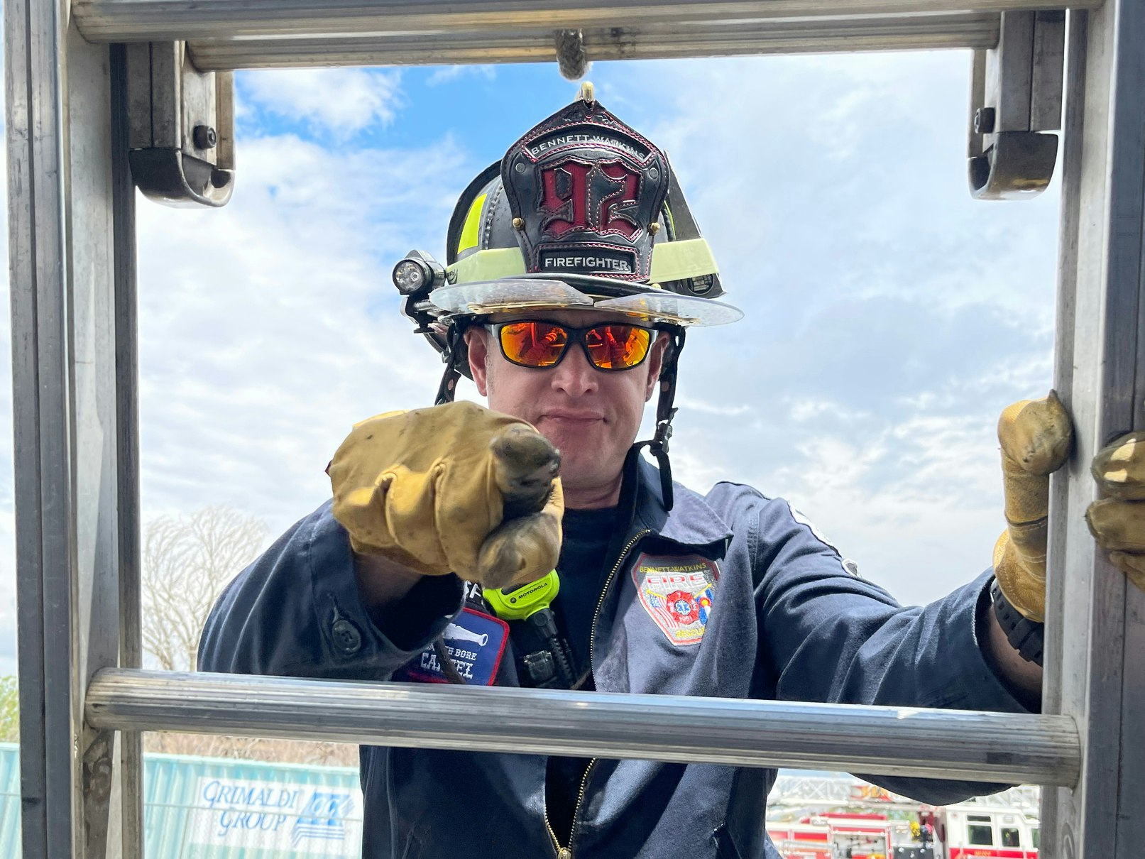 May contain: person, worker, adult, male, man, clothing, glove, and fireman