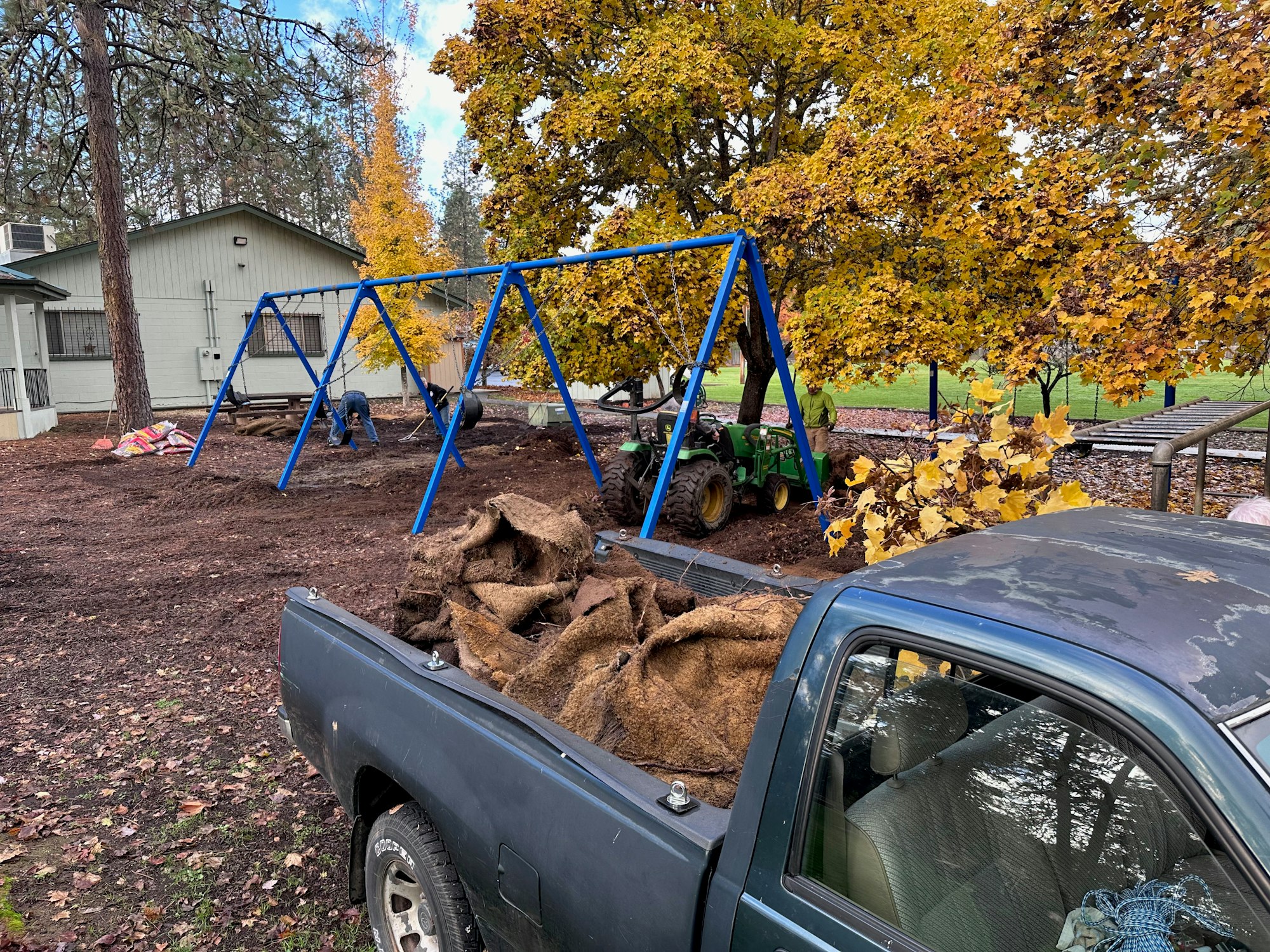 May contain: person, outdoors, pickup truck, transportation, truck, vehicle, and play area