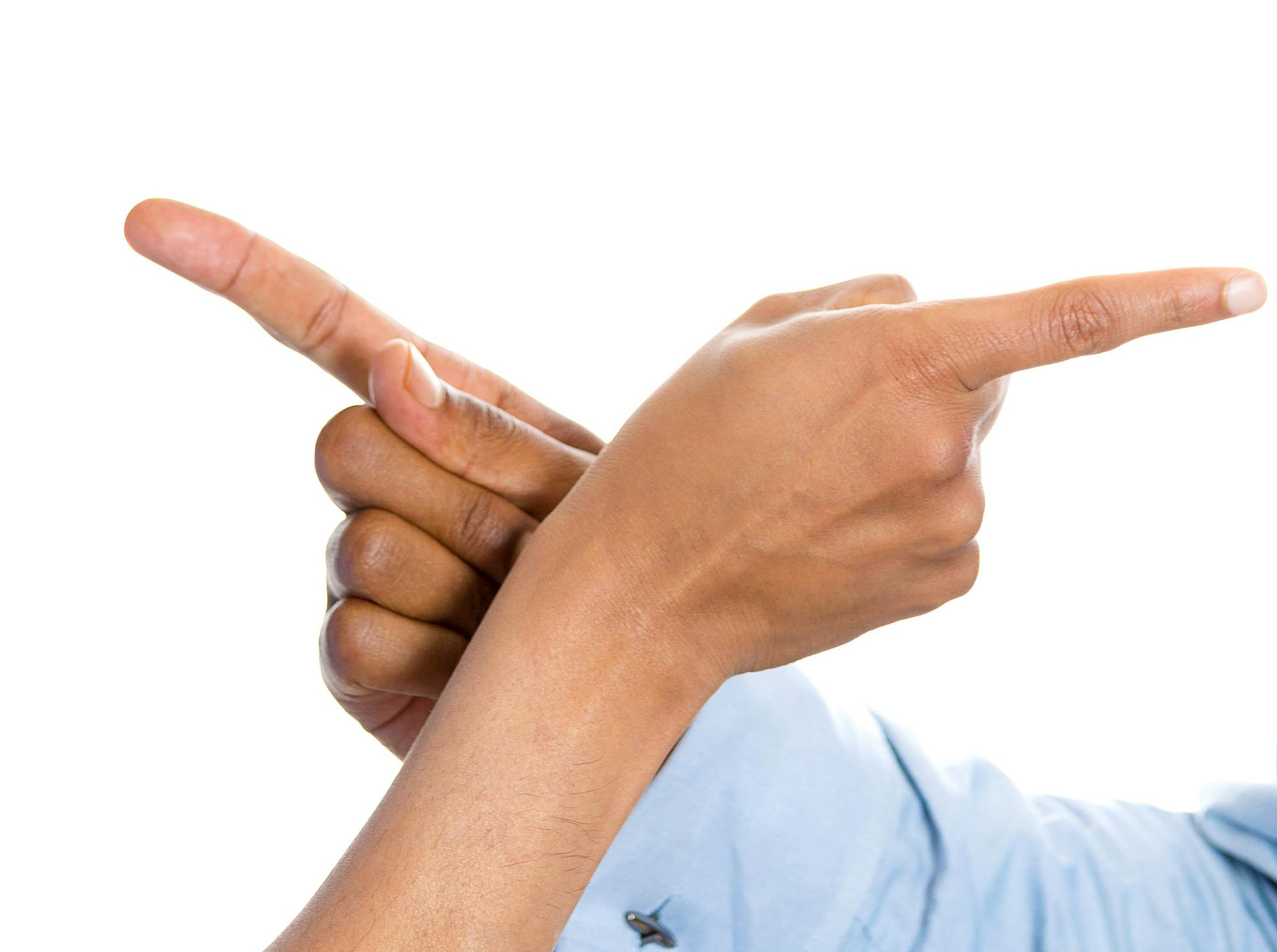 Two men facing each other, appearing to be in a confrontational or argumentative situation, pointing fingers.