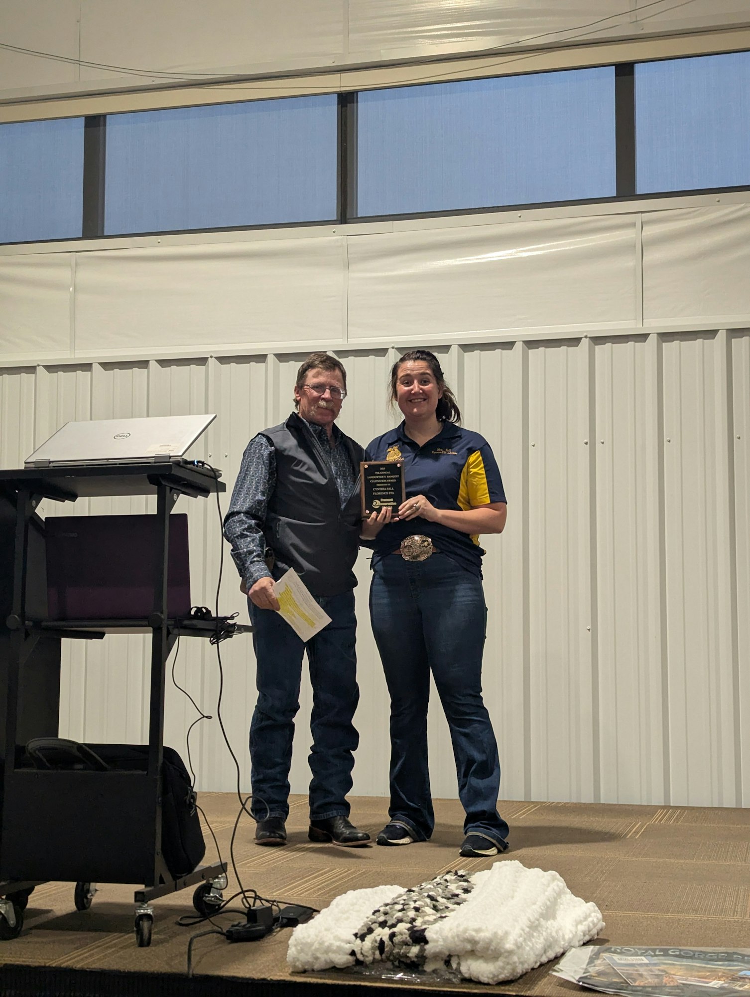 Cynthia Fall receives conservation award.