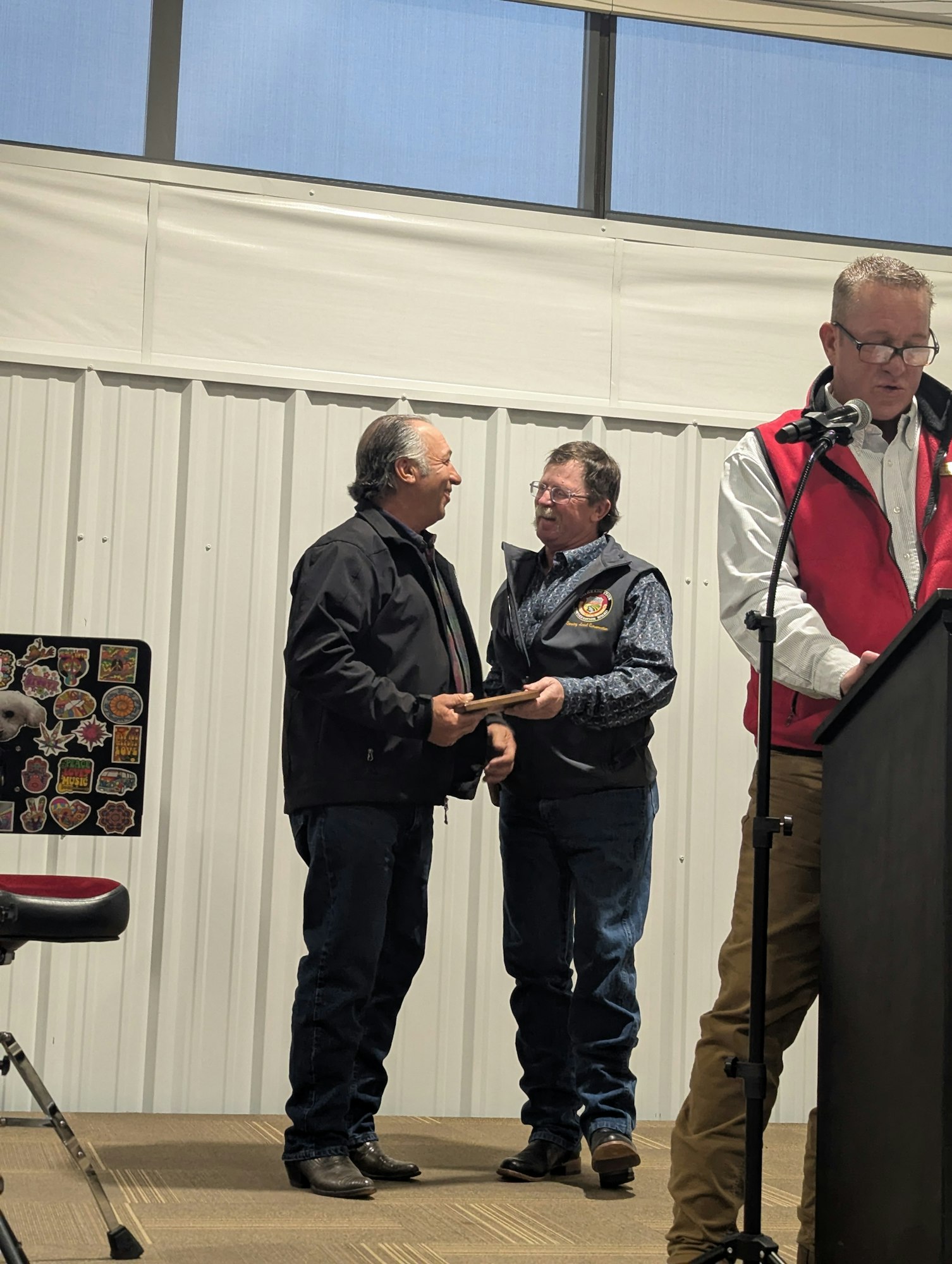 Tim Madone receives conservation award.