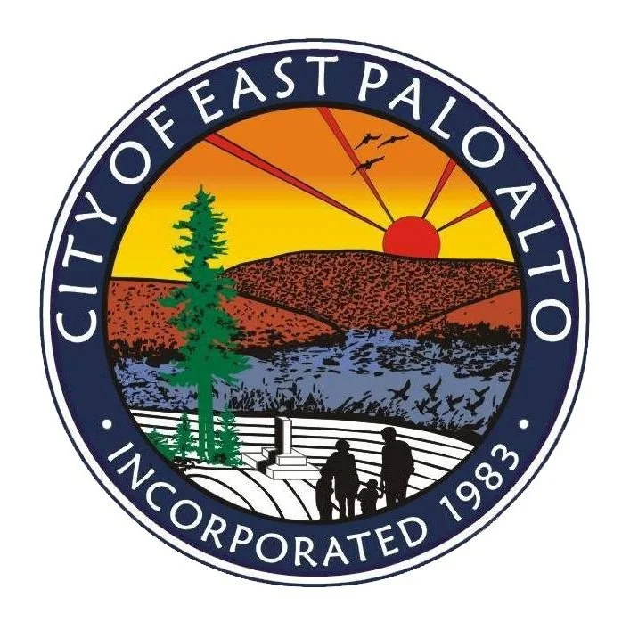 Seal of East Palo Alto with a sunset, tree, hills, people, and "City of East Palo Alto Incorporated 1983" text.