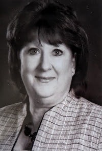 May contain: face, head, person, photography, portrait, happy, smile, accessories, earring, jewelry, body part, and neck