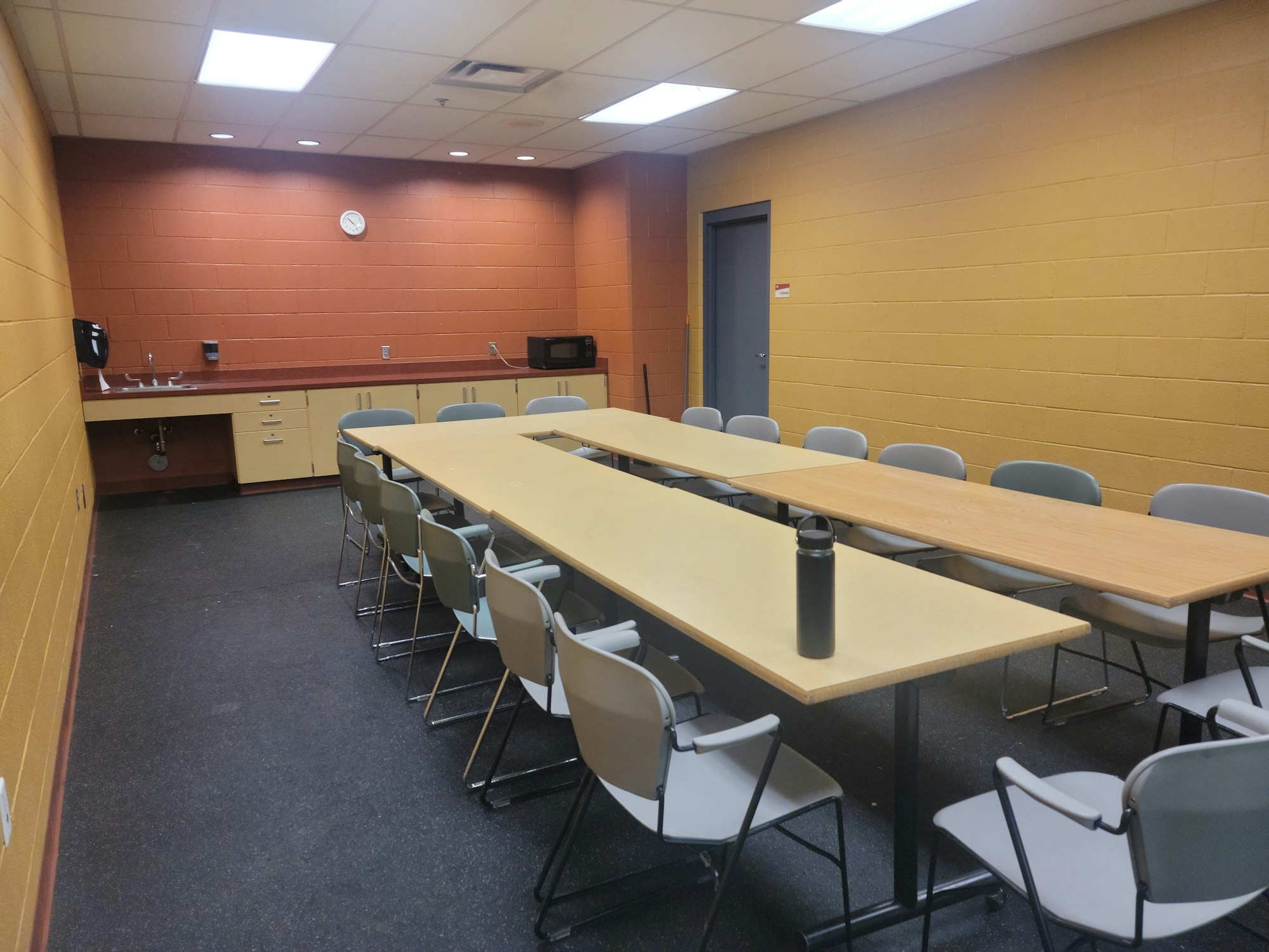 Ice Party Room with tables and chairs set up.