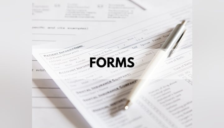 A stack of forms with a pen on top, labeled "FORMS."