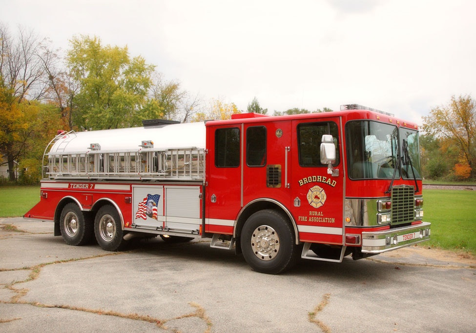A red fire truck labeled "TENDER 7" from the Brodhead Rural Fire Association.