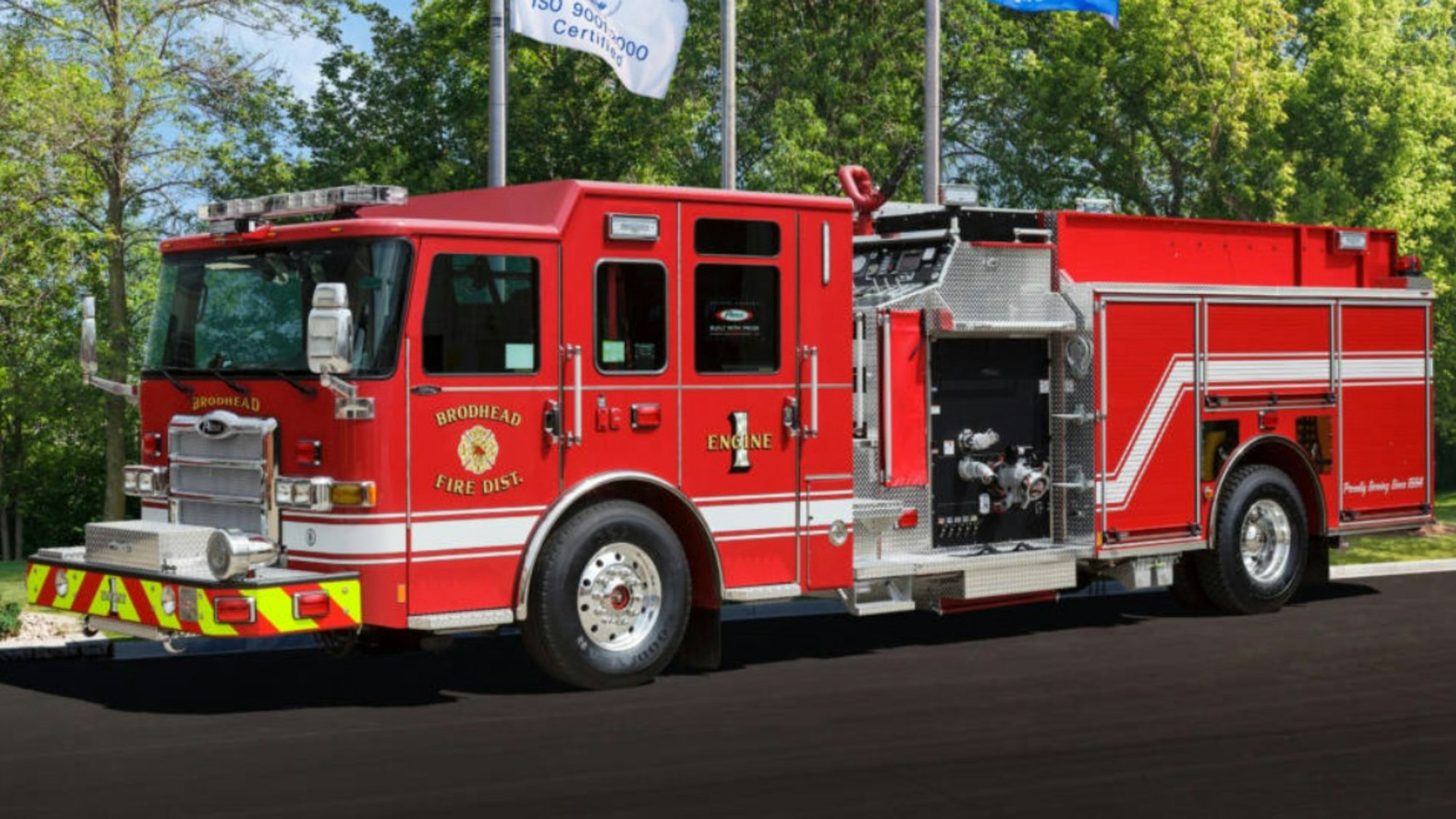 Red fire engine parked outdoors, labeled "BRODHEAD FIRE DIST."