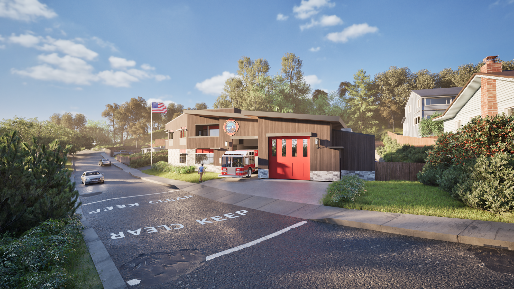 A fire station with a fire truck, an American flag, houses, and greenery on a sunny day.