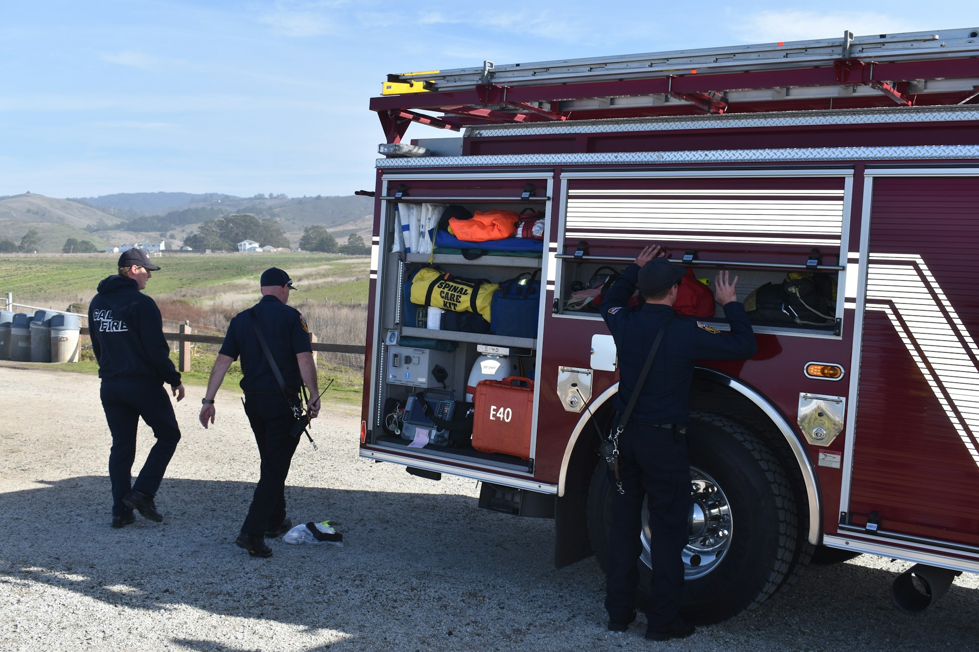 May contain: person, human, vehicle, transportation, truck, fire truck, machine, and wheel
