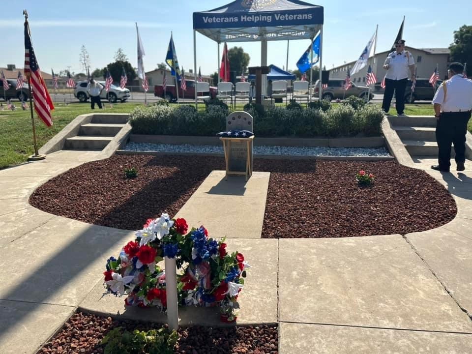 May contain: grass, nature, outdoors, park, plant, architecture, building, shelter, person, potted plant, car, transportation, and vehicle