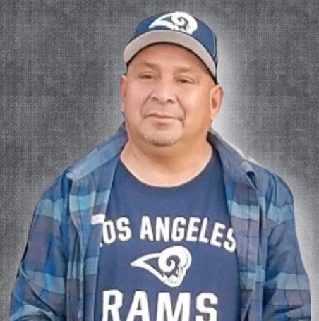 May contain: cap, baseball cap, hat, clothing, people, person, portrait, photography, head, face, shirt, and t-shirt