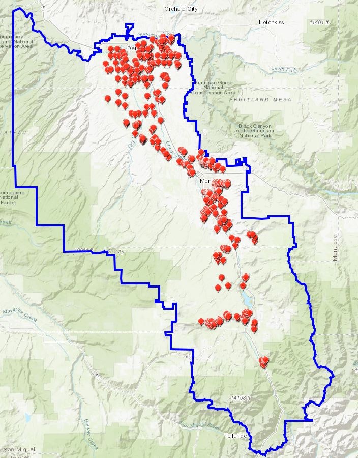 A map with a marked boundary and red icons, likely representing data points or locations of interest within that area.