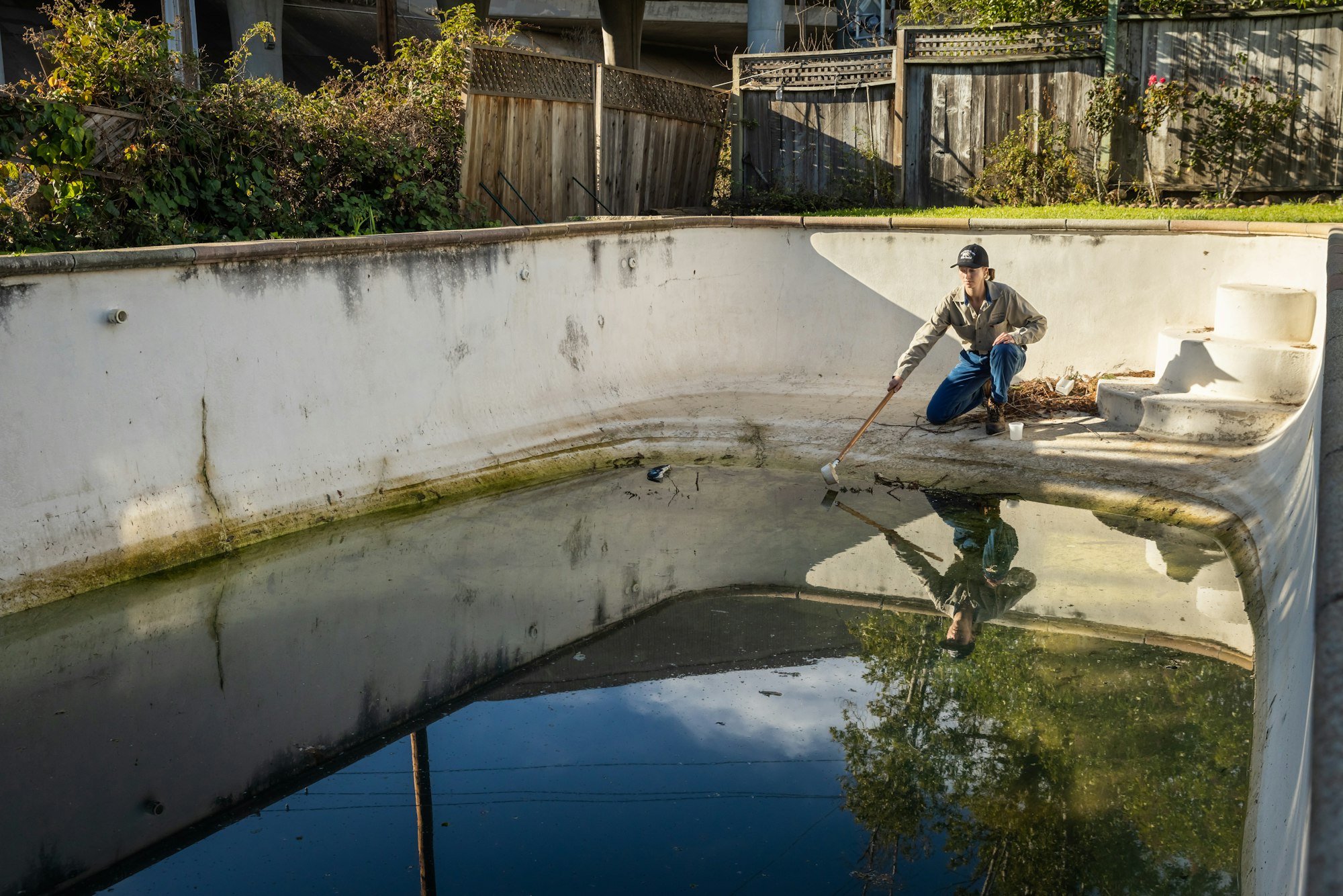 May contain: water, person, human, outdoors, handrail, banister, and nature