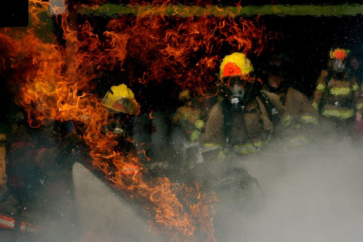 May contain: person and fire