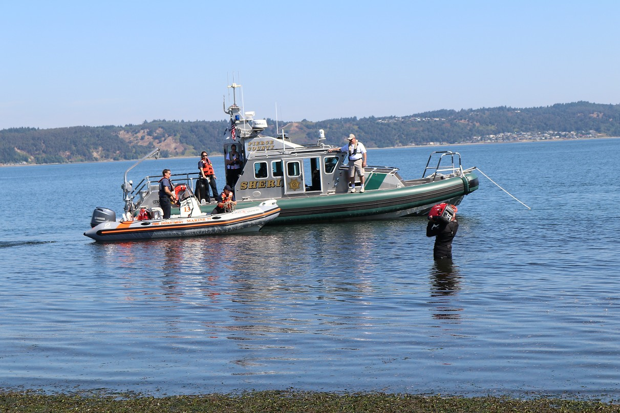 May contain: person, boat, transportation, vehicle, water, waterfront, outdoors, and watercraft