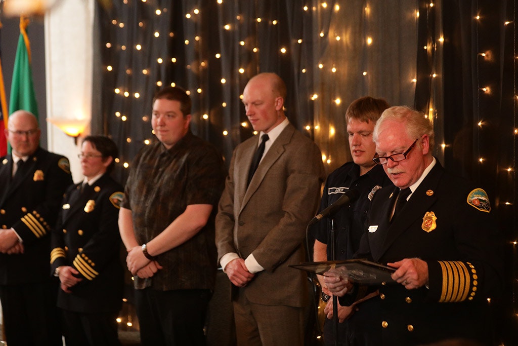 May contain: person, human, military, military uniform, officer, tie, accessories, accessory, suit, clothing, coat, overcoat, and apparel